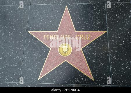 The Hollywood Walk of Fame comprises more than 2,600 five-pointed terrazzo and brass stars embedded in the sidewalks  of Hollywood Boulevard Stock Photo