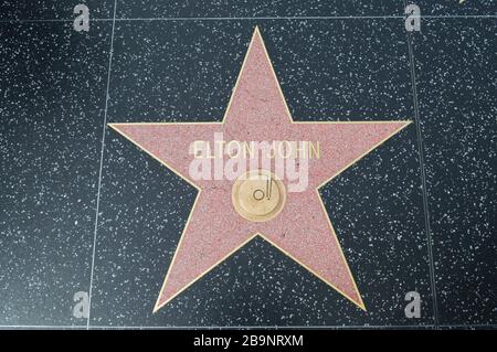 The Hollywood Walk of Fame comprises more than 2,600 five-pointed terrazzo and brass stars embedded in the sidewalks  of Hollywood Boulevard. Stock Photo