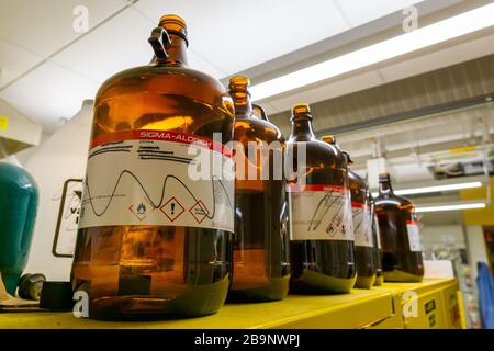 Cambridge MA USA - circa March 2020 - Empty solvent bottles in a laboratory Stock Photo