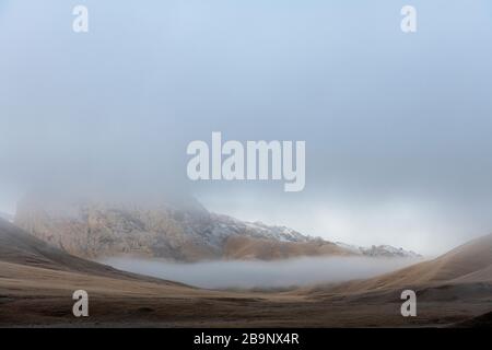 early morning landscapes in the Ak-Sai valley heading to the Kol Suu lake in Kyrgyzstan Stock Photo