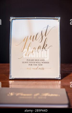 Vertical shot of a wedding guest book for writing wishes Stock Photo