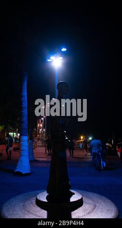 Street Sculpture at night on the Malecon in Puerto Vallarta Mexico Stock Photo