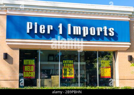 Pier 1 Imports store facade with sale discounts due to the closing of the store. The chain declares bankruptcy and files for Chapter 11 protection - F Stock Photo