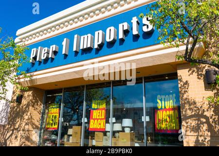Pier 1 Imports store exterior with sale discounts due to the closing of the store. The chain declares bankruptcy and files for Chapter 11 protection - Stock Photo