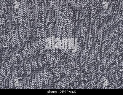 Texture of knitted fabric. Cold weather background. Warm black and white wool sweater texture. Knitted fabric background. Stock Photo