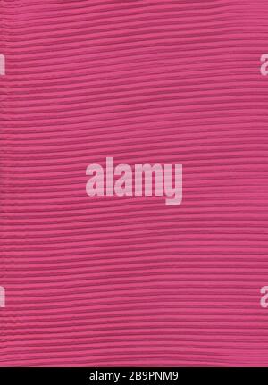 Pink plisse fabric background texture. Pleated skirt fabric. Pink fabric decorative. Stock Photo