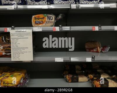 Glasgow, UK. 25th Mar, 2020. Distancing measures introduced in a local Cooperative store in New Gorbals showing markers on the floor indicating 2m distance, as well as limits on the number of items available to buy, Glasgow, UK Credit: Alamy News/Pawel Pietraszewski Credit: Pawel Pietraszewski/Alamy Live News Stock Photo