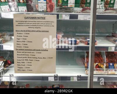 Glasgow, UK. 25th Mar, 2020. Distancing measures introduced in a local Cooperative store in New Gorbals showing markers on the floor indicating 2m distance, as well as limits on the number of items available to buy, Glasgow, UK Credit: Alamy News/Pawel Pietraszewski Credit: Pawel Pietraszewski/Alamy Live News Stock Photo