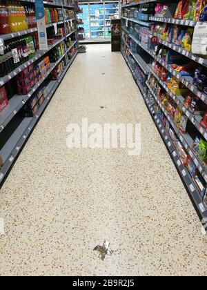 Glasgow, UK. 25th Mar, 2020. Distancing measures introduced in a local Cooperative store in New Gorbals showing markers on the floor indicating 2m distance, as well as limits on the number of items available to buy, Glasgow, UK Credit: Alamy News/Pawel Pietraszewski Credit: Pawel Pietraszewski/Alamy Live News Stock Photo