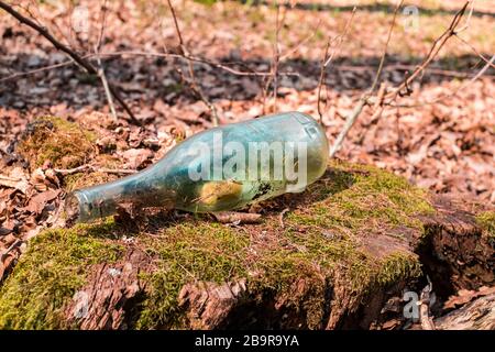 an old bottle with a cork stopper inside Stock Photo