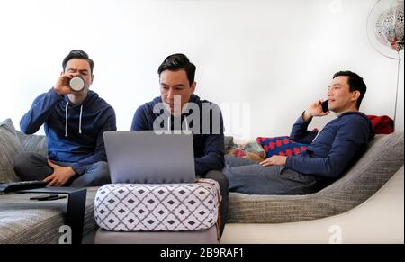 Montage with the same man working from home in multiple poses Stock Photo