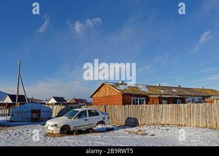 KHATGAL, MONGOLIA, March 1, 2020 : Khatgal streets in winter. The small town is known as one of the coldest cities in Mongolia but it owes its recent Stock Photo