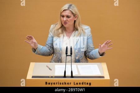 Munich, Germany. 25th Mar, 2020. Melanie Huml (CSU), Health Minister of Bavaria, speaks in the Bavarian parliament during a plenary session. In the fight against the spread of the coronavirus, a new Bavarian infection protection law is to be passed during the session. Credit: Sven Hoppe/dpa/Alamy Live News Stock Photo