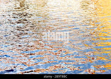 Vibrant colours reflected in water on a bright summers day in England, UK Stock Photo