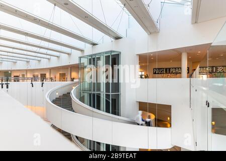 Inside the ARoS art gallery in Aarhus, Denmark. Designed by architects Schmidt Hammer Lassen. Galleries are accessed via a central spiral staircase. Stock Photo