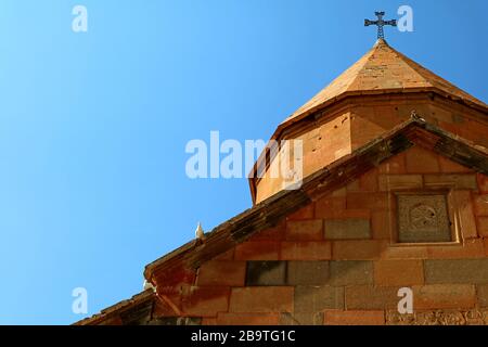 Dome of the Armenian Orthodox Church on Sunny Sky with Three of Pigeons Perching Stock Photo