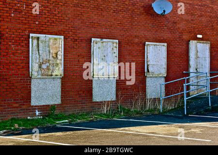 The boarded-up former RAOB Club (Royal Antediluvian Order of Buffaloes, or 'Buffs') is now closed and awaiting demolition,possibly to provide housing. Stock Photo