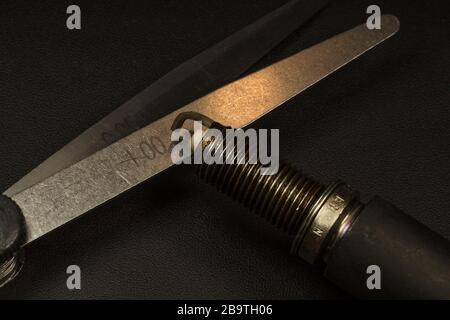 Spark plug and feeler gauge. Internal combustion engine service. Stock Photo