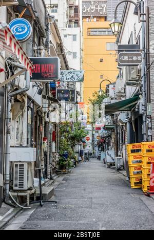 Small alley full of back street tiny bars in Golden Gai area during the day. Located in Kabukichō red light district, Shinjuku ward, Tokyo, Japan Stock Photo