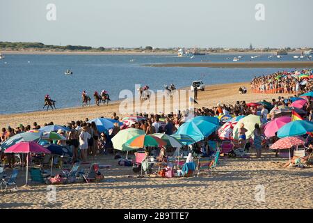 The annual August horserace meeting run on the beach at Sanlucar de Barrameda, Cadiz, Spain. 3rd August 2017. Stock Photo