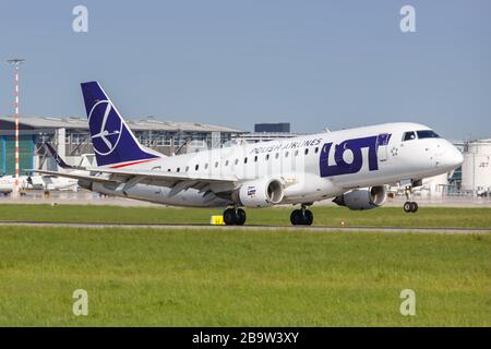 Stuttgart, Germany – May 9, 2018: LOT Polish Airlines Embraer 175 airplane at Stuttgart airport (STR) in Germany. Stock Photo