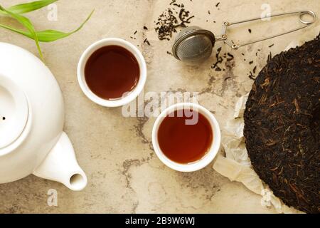 Chinese tea. Pu erh Puerh Tea Cake, top view Stock Photo
