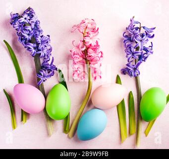 Spring Easter background with flowers and decoration eggs, copy space Stock Photo