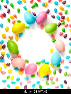 Easter eggs and candy background with copy space Stock Photo