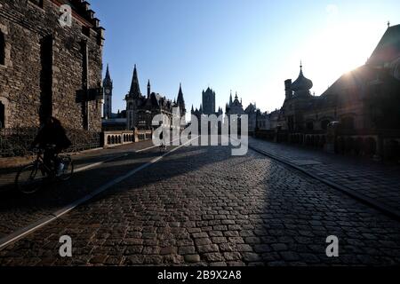 Cobblestone street Sint-Michielsplein with a view of St. Michael's Church in the old town of Ghent. Stock Photo