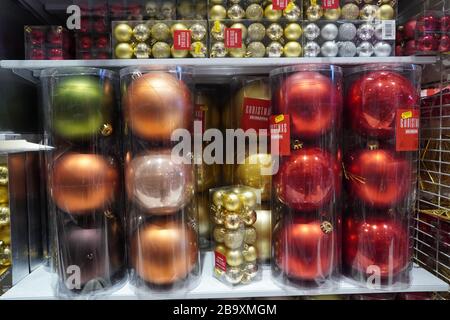 Dubai UAE December 2019 Beautiful multicolored Christmas balls in Christmas market. Sale of Christmas decorations and baubles in the store. Christmas Stock Photo