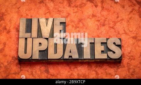 live updates word abstract in vintage letterpress wood type, media and communication concept Stock Photo