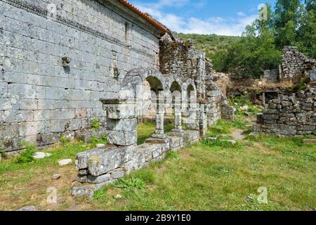 Cloister arcade ruins, Pitoes Monastery, Pitoes das Junias, Peneda Geres National Park, Minho, Portugal Stock Photo