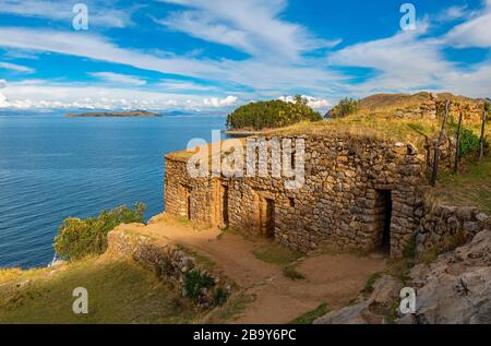 The Inca ruins of Chincana at sunset on the sun island or Isla del Sol with a view over the Titicaca Lake, Bolivia. Stock Photo