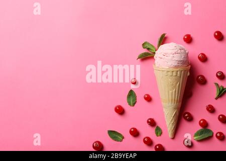 Ice cream and berries on pink background. Sweet food Stock Photo