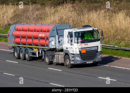 BOC Linde Group;  Haulage delivery trucks, lorry, transportation, truck, cargo carrier, DAF CF vehicle, European commercial transport, industry, M6 at Manchester, UK Stock Photo