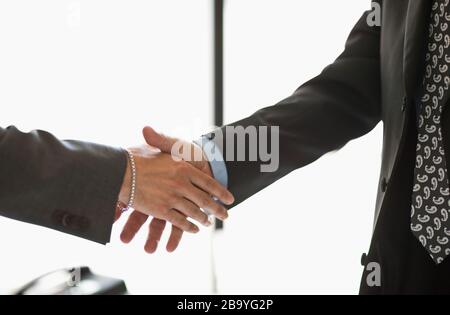 Two businessmen shake hands. Stock Photo
