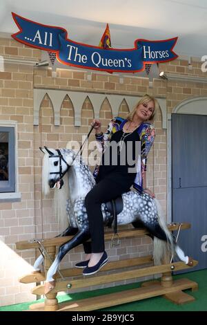 May 21, 2018 - London, England, UK - RHS Chelsea Flower Show Press Day Photo Shows: Joanna Lumley rides a rocking horse on the Stevenson Brothers trad Stock Photo