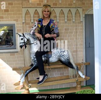 May 21, 2018 - London, England, UK - RHS Chelsea Flower Show Press Day Photo Shows: Joanna Lumley rides a rocking horse on the Stevenson Brothers trad Stock Photo