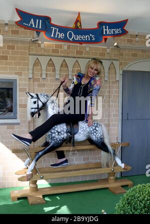 May 21, 2018 - London, England, UK - RHS Chelsea Flower Show Press Day Photo Shows: Joanna Lumley rides a rocking horse on the Stevenson Brothers trad Stock Photo