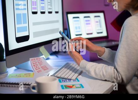 Designers create a user interface for mobile phones Stock Photo