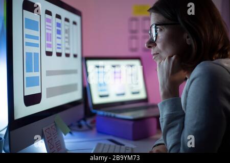 Designers create a user interface for mobile phones Stock Photo