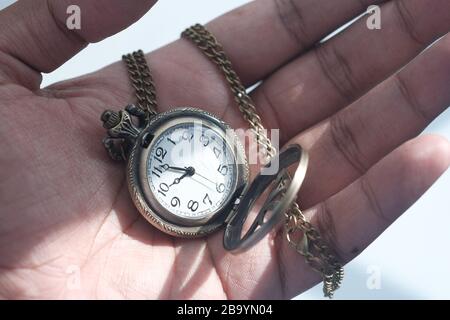old antique classic clocks on hand, close up  Stock Photo