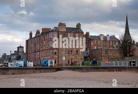Portobello, Edinburgh, Scotland, UK. 25th March 2020. Extremely quiet afternoon on Portobello Beach promenade. Few people will be viewing the Out of The Blue Science Festival Photo Display. Stock Photo