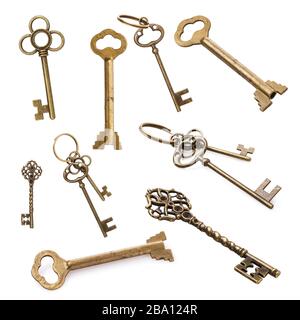 Set of vintage keys isolated on a white background Stock Photo