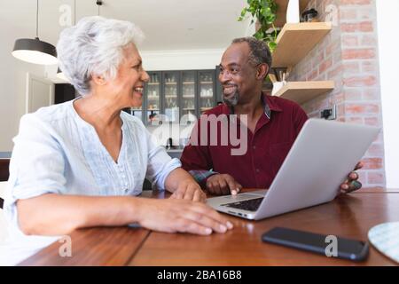 Senior African American couple using laptop Stock Photo