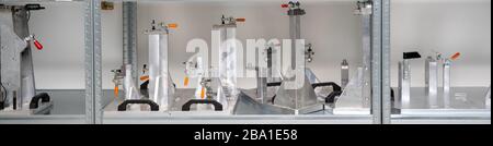 rack with tools for precise 3D measurement of plastic products for the automotive industry Stock Photo