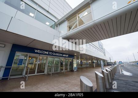 Glasgow, UK. 25th Mar, 2020. Pictured: Views the interior of Glasgow Airport passenger terminal showing the place deserted due to airlines suspending and cancelling flights due to the coronavirus pandemic. Credit: Colin Fisher/Alamy Live News Stock Photo