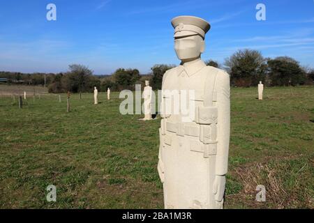 Carved Stone Soldier Sculptures at Langley Vale First World War Centenary Wood Surrey by sculptor Patrick Walls Stock Photo