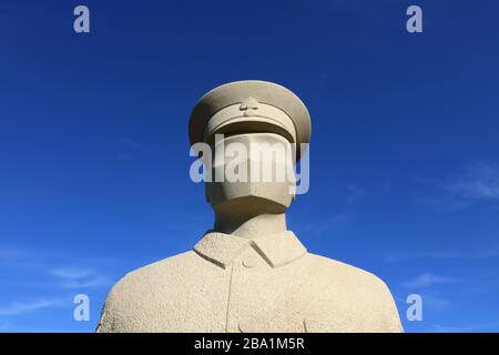 Carved Stone Soldier Sculptures at Langley Vale First World War Centenary Wood Surrey by sculptor Patrick Walls Stock Photo