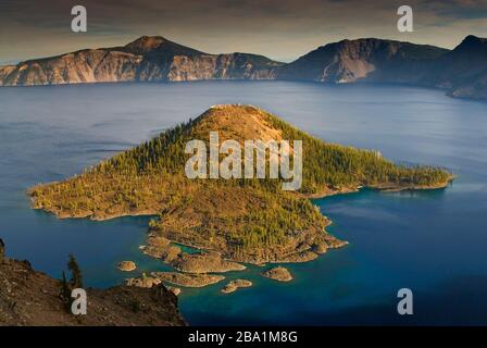 Wizard Island at Crater Lake seen from Watchman Overlook on West Rim Drive at Crater Lake National Park, Oregon, USA Stock Photo